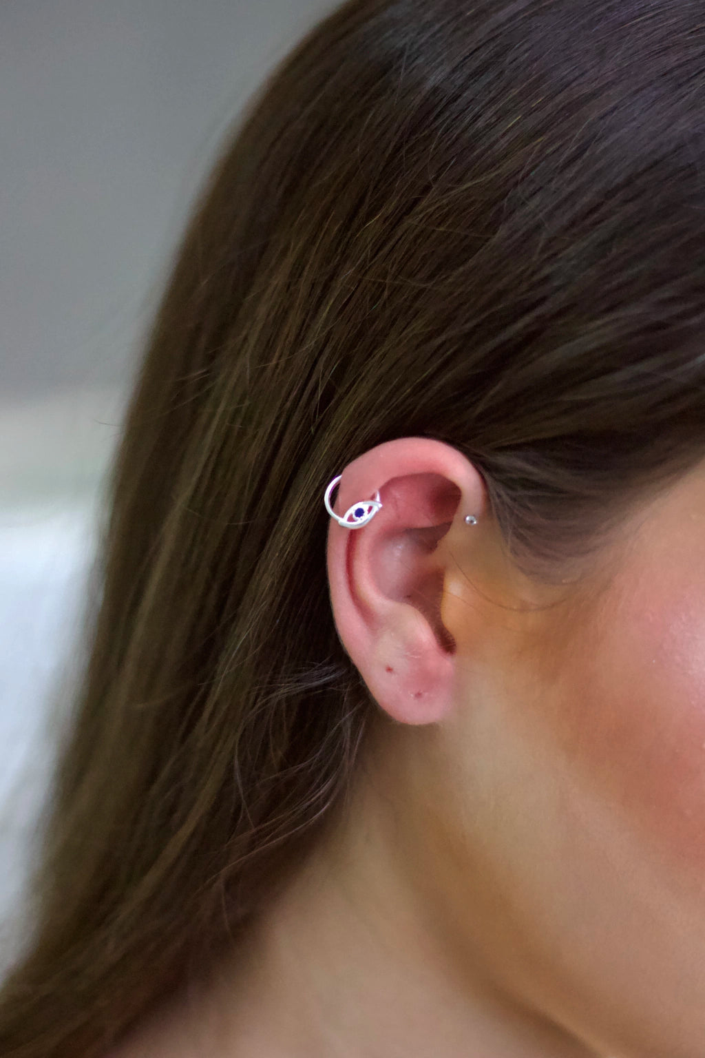 Piercing Hélix Olho Grego